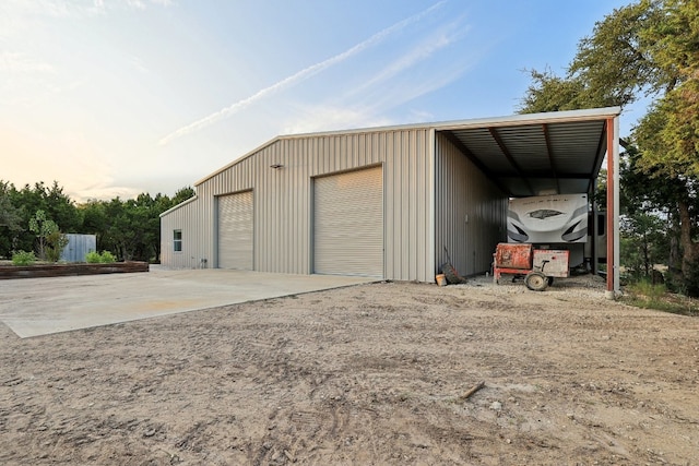 garage with a carport