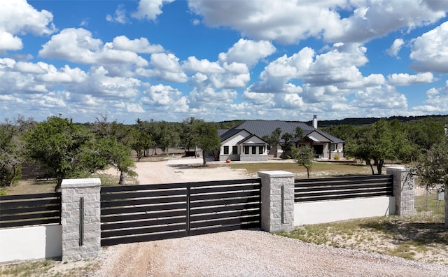 view of gate featuring a rural view