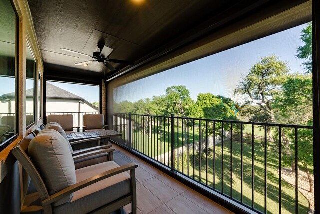 balcony featuring ceiling fan