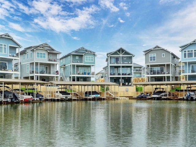 property view of water with a dock