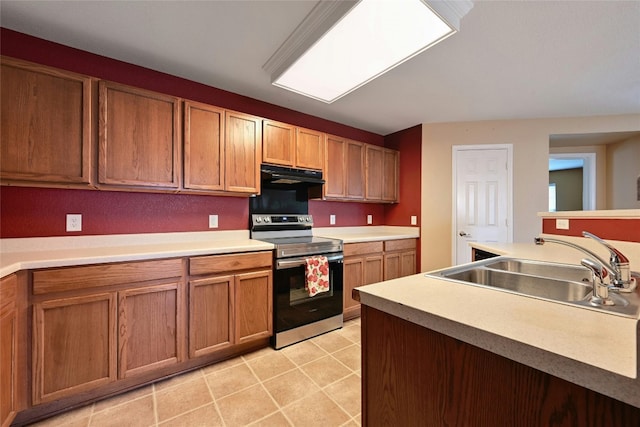 kitchen featuring electric stove and sink