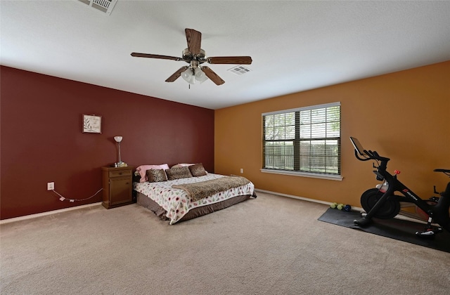 bedroom featuring ceiling fan and carpet floors