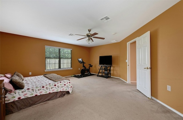 bedroom featuring light carpet and ceiling fan