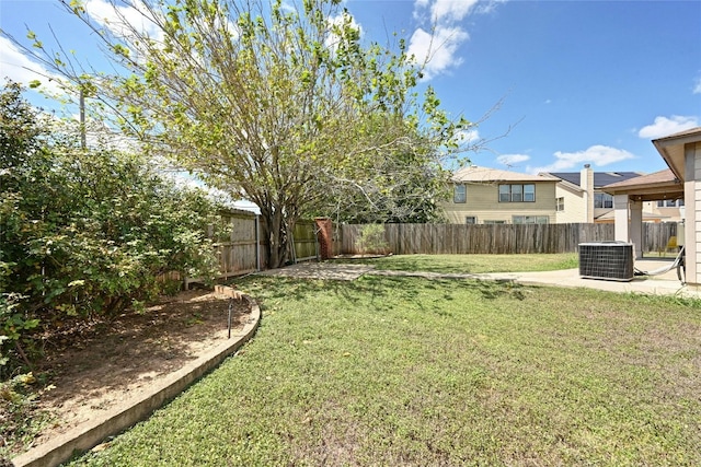 view of yard with central AC