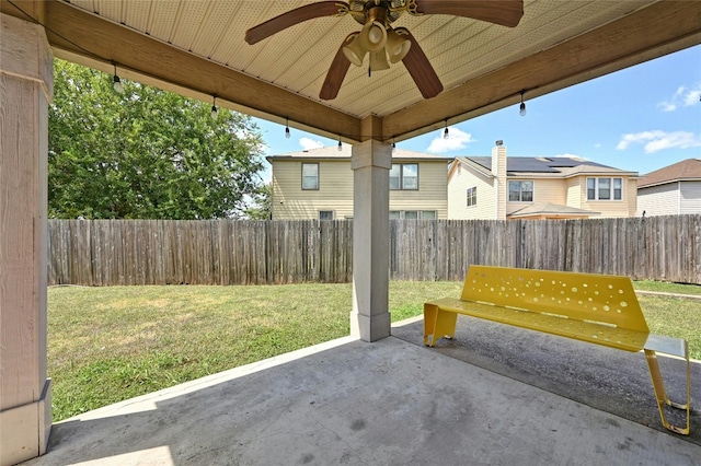 view of patio featuring ceiling fan and a fenced backyard