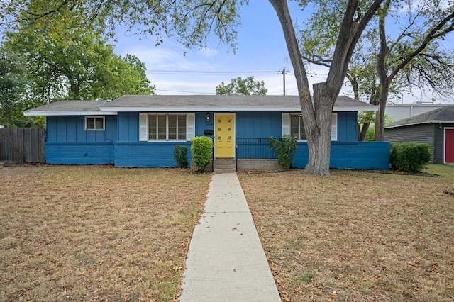 5807 Wynona Ave, Austin, TX 78756 - view of front of home featuring board and batten siding, covered porch, and brick siding