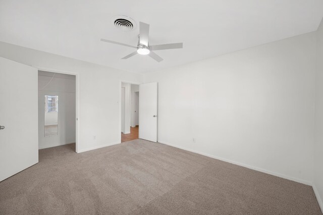5807 Wynona Ave, Austin, TX 78756 - unfurnished bedroom featuring carpet floors and ceiling fan