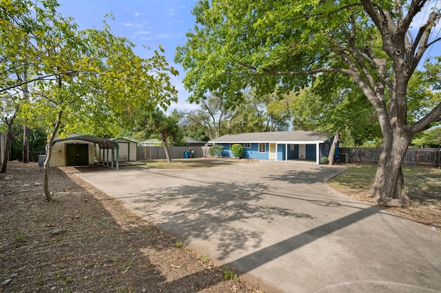5807 Wynona Ave, Austin, TX 78756 - view of front of home featuring driveway and a detached carport
