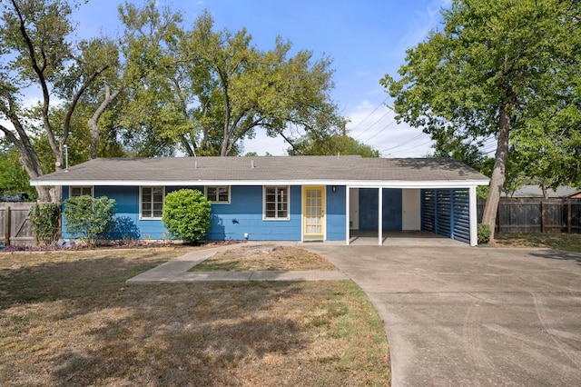 5807 Wynona Ave, Austin, TX 78756 - ranch-style house featuring driveway and an attached carport