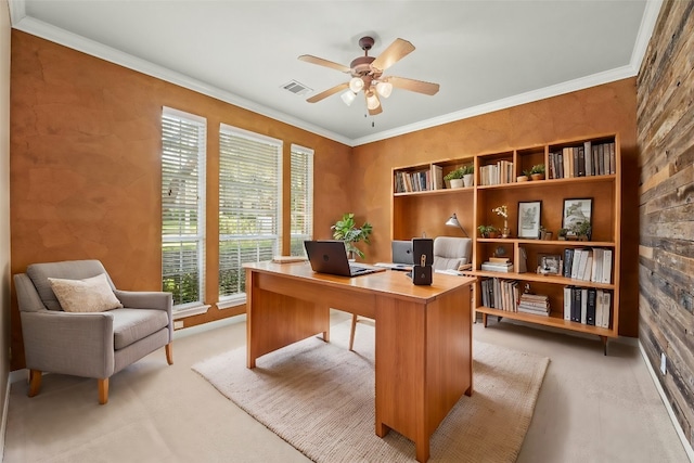 office space featuring ceiling fan and ornamental molding