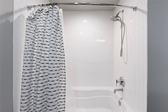 bathroom featuring shower / bath combo with shower curtain