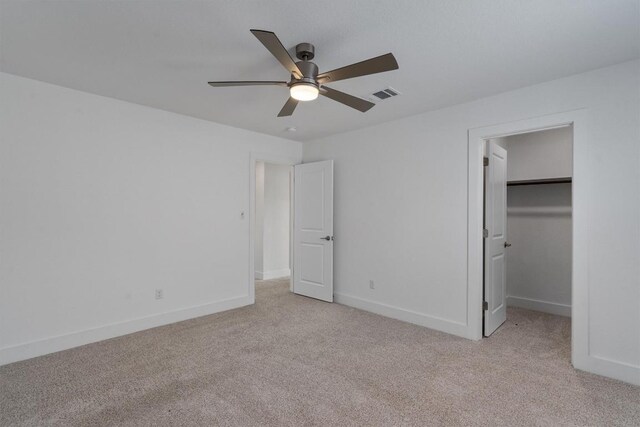 1029 Villa Rialto Vw, Leander, TX 78641 - unfurnished bedroom with light colored carpet, a spacious closet, and baseboards