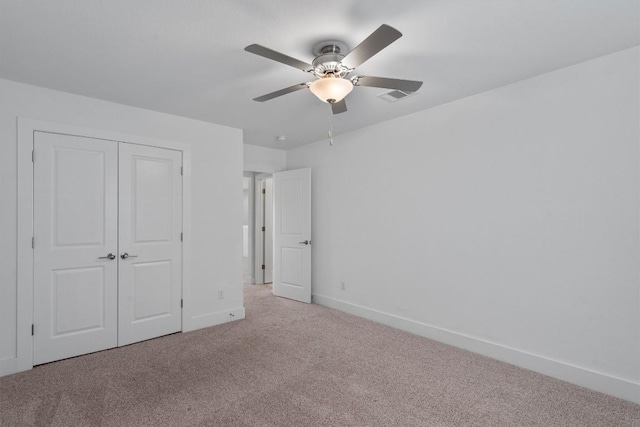 1029 Villa Rialto Vw, Leander, TX 78641 - unfurnished bedroom featuring carpet floors, baseboards, a closet, and a ceiling fan
