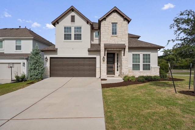 view of front facade with a front yard and a garage