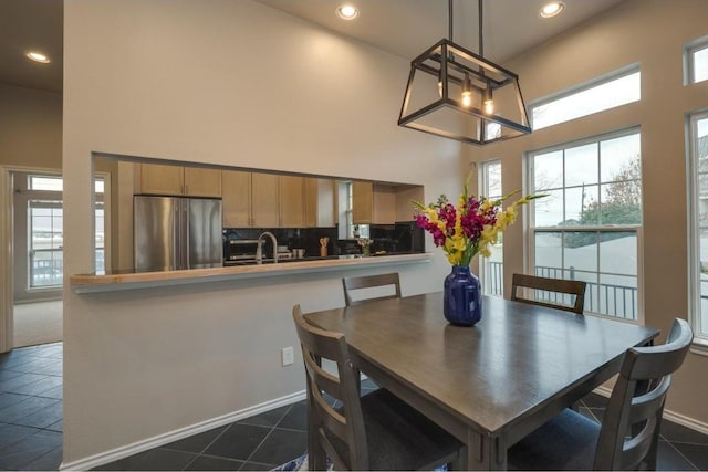 2918 Ranch Road 620th Rd N Unit U-254, Austin, TX 78734 - dining area with a high ceiling, dark tile patterned flooring, recessed lighting, and baseboards