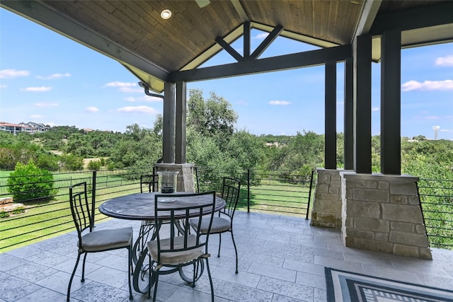 view of patio with a balcony