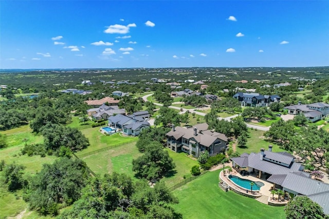 birds eye view of property with a residential view