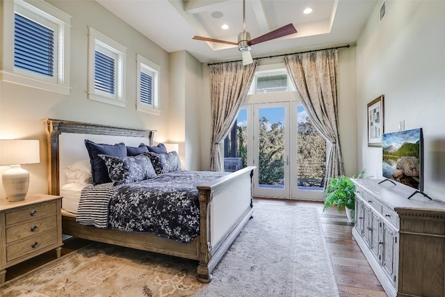 bedroom featuring access to exterior, recessed lighting, visible vents, light wood-type flooring, and coffered ceiling