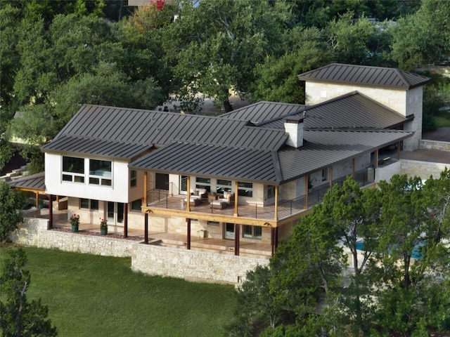 rear view of house with a lawn