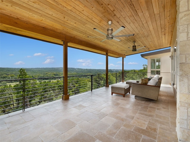 view of patio / terrace with a balcony, an outdoor hangout area, and ceiling fan