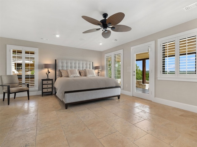 bedroom with ceiling fan and access to outside