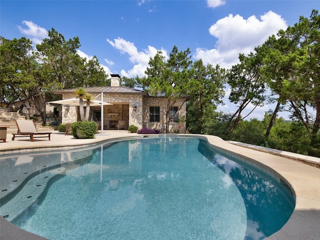 view of pool with a patio area