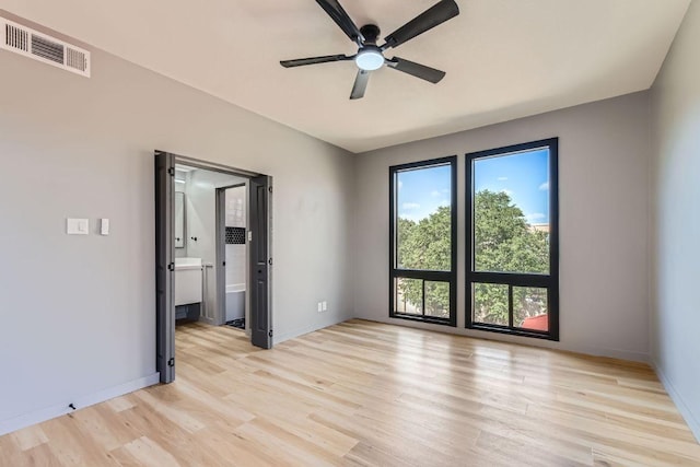 1707 Spyglass Dr Unit 60, Austin, TX 78746 - spare room featuring light wood finished floors and ceiling fan