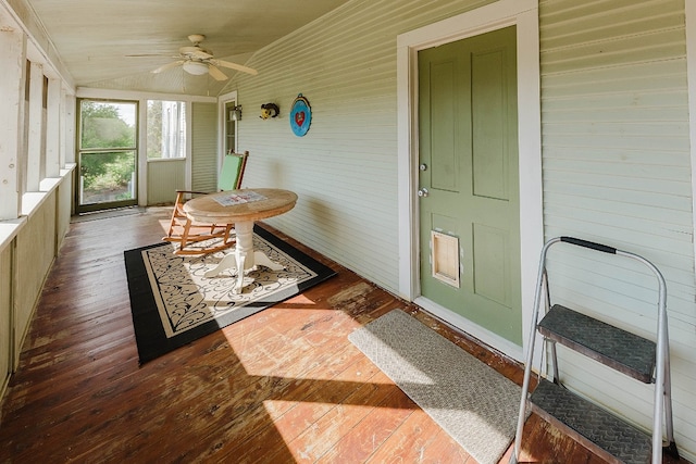 sunroom with vaulted ceiling and ceiling fan