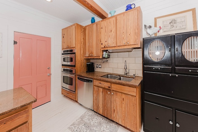 kitchen featuring backsplash, stainless steel appliances, beam ceiling, and sink