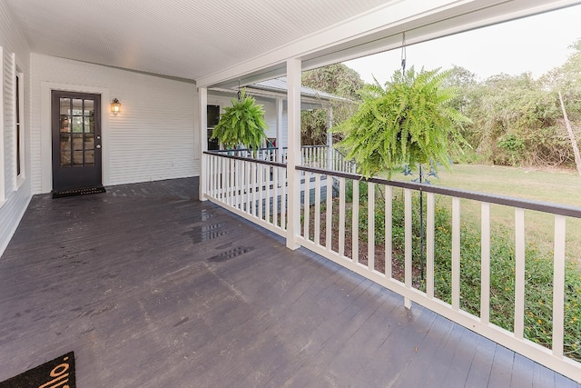 unfurnished sunroom with plenty of natural light