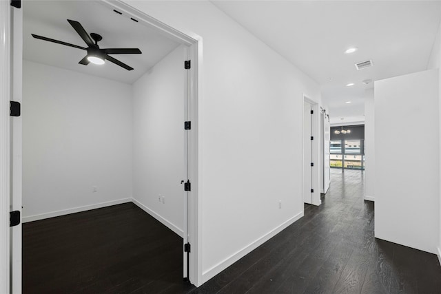 hallway with dark wood-type flooring