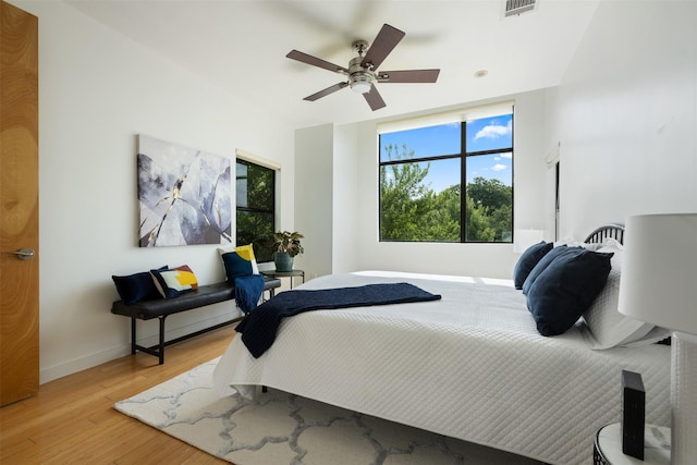 bedroom featuring ceiling fan and light wood-type flooring