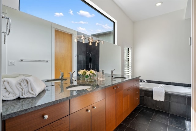 bathroom with vanity, shower with separate bathtub, and tile patterned floors