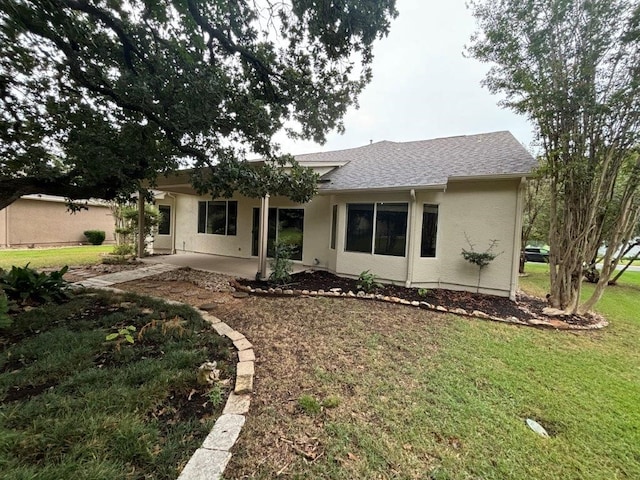 405 Dawson Trl, Georgetown, TX 78633 - back of house with a patio area, a yard, stucco siding, and roof with shingles