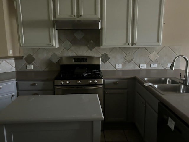 405 Dawson Trl, Georgetown, TX 78633 - kitchen with dishwasher, a sink, stainless steel gas stove, under cabinet range hood, and decorative backsplash
