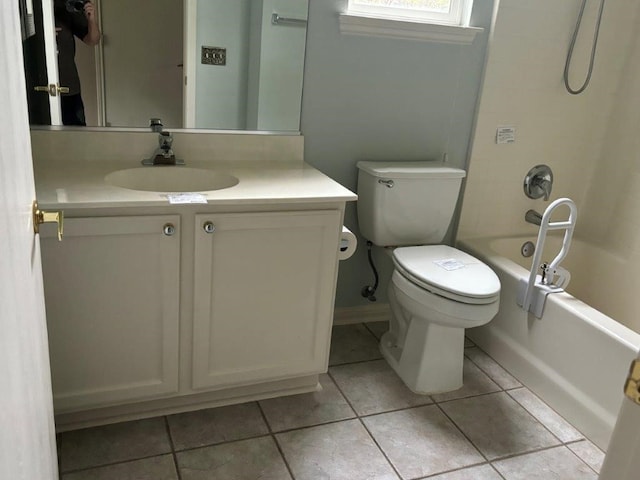 405 Dawson Trl, Georgetown, TX 78633 - bathroom featuring vanity, washtub / shower combination, tile patterned floors, and toilet
