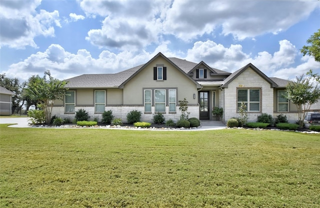 view of front facade with a front yard