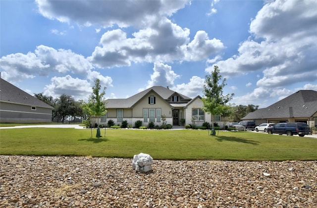 view of front of home with a front yard