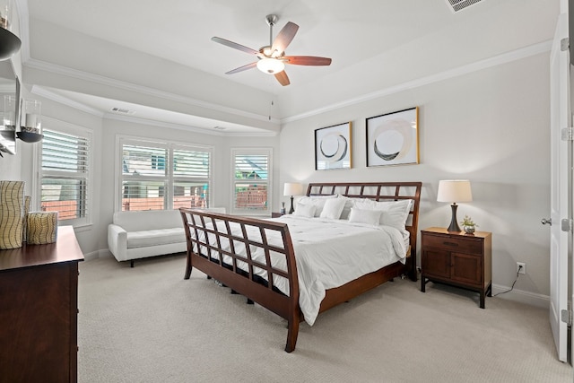 bedroom with ceiling fan, light colored carpet, and crown molding