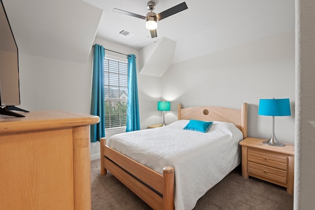 carpeted bedroom with visible vents, baseboards, and ceiling fan