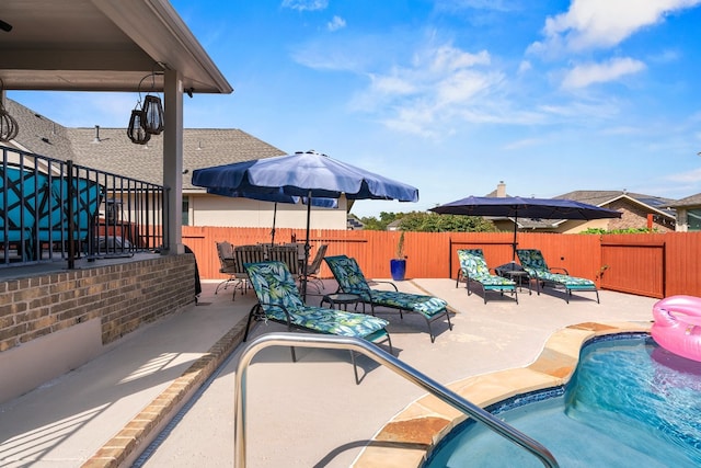 view of pool with a patio area