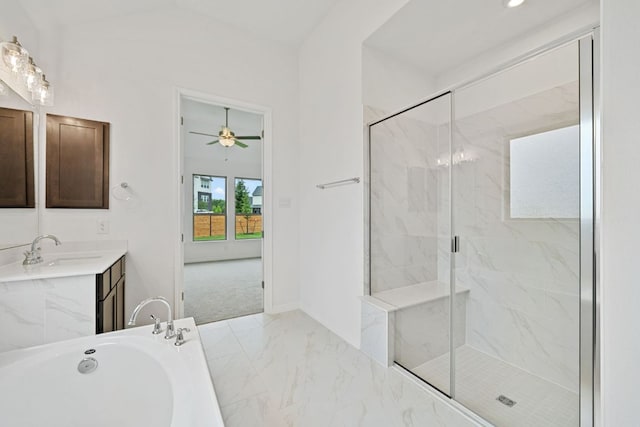 408 Ridgewell Loop, Georgetown, TX 78633 - bathroom featuring a marble finish shower, marble finish flooring, vanity, and a garden tub