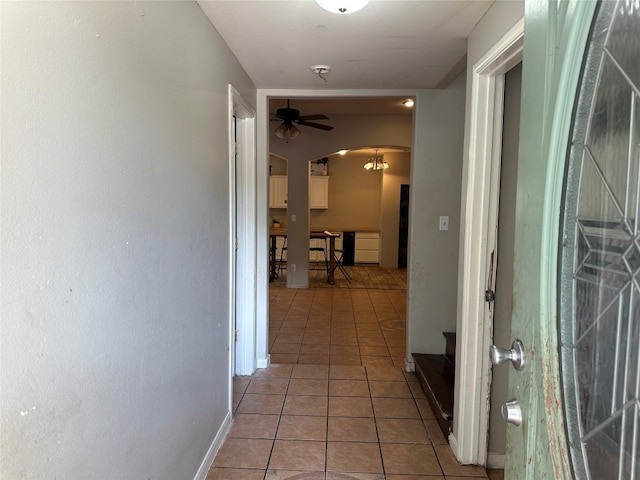 corridor featuring tile patterned flooring