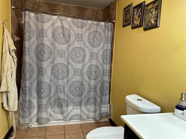 full bathroom featuring shower / bath combination with curtain, tile patterned flooring, vanity, and toilet