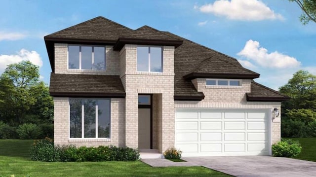 view of front of home with a garage and a front lawn