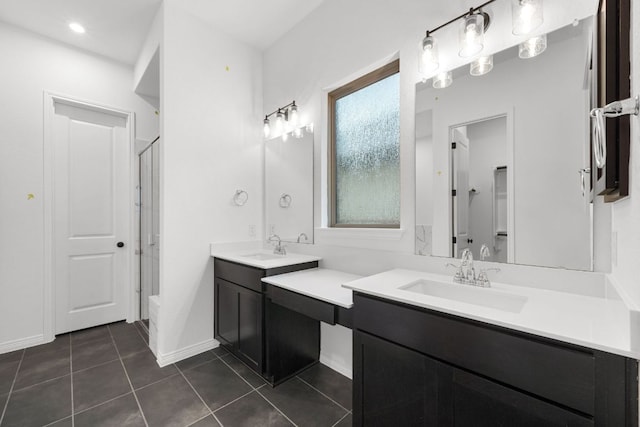 537 Raleigh Dr, Georgetown, TX 78633 - full bathroom with a shower with door, tile patterned floors, and vanity