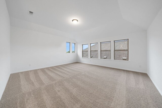 537 Raleigh Dr, Georgetown, TX 78633 - carpeted spare room featuring vaulted ceiling and baseboards