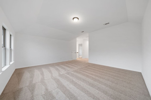 537 Raleigh Dr, Georgetown, TX 78633 - spare room with vaulted ceiling and carpet flooring