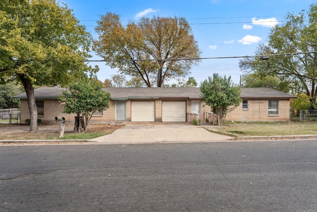 single story home with a garage