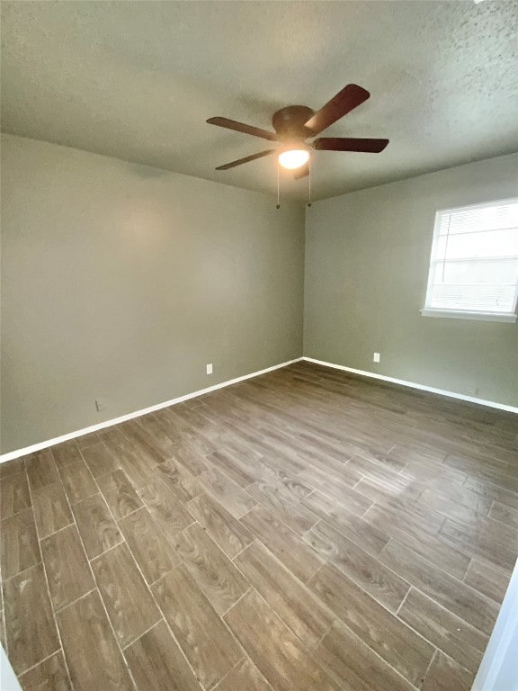 spare room featuring ceiling fan